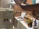 Utility room with washer and dryer, Bryant HVAC system, and storage shelves at 3215 Hembry Ct, Marietta, GA 30062