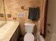 Full bathroom with wallpaper, a vanity with a marble countertop, and a shower at 3215 Hembry Ct, Marietta, GA 30062