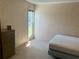 Bedroom featuring light walls, small window and a dresser at 3215 Hembry Ct, Marietta, GA 30062