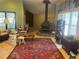 Spacious living room with tile floors, a large indoor fireplace, and natural light at 3215 Hembry Ct, Marietta, GA 30062