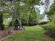 Spacious backyard featuring a swing set and play area for children at 2038 Lee Se Rd, Smyrna, GA 30080