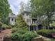 Spacious backyard with a covered porch and a beautiful garden at 2038 Lee Se Rd, Smyrna, GA 30080
