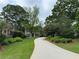 Beautiful home with a long driveway and lush green lawn at 2038 Lee Se Rd, Smyrna, GA 30080