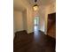 Hallway with hardwood floors, natural light, and white trim at 2038 Lee Se Rd, Smyrna, GA 30080