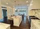 Eat in kitchen with granite counters, stainless steel appliances, island with seating and natural light at 2038 Lee Se Rd, Smyrna, GA 30080