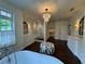 Beautiful main bathroom with marble shower, vanities, a soaking tub and chandelier at 2038 Lee Se Rd, Smyrna, GA 30080