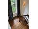 Stairway with dark wood stairs, iron railing, a window and natural light at 2038 Lee Se Rd, Smyrna, GA 30080