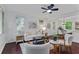 Bright living room with hardwood floors, neutral decor, and lots of natural light at 2599 E Tupelo Se St, Atlanta, GA 30317