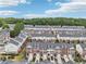 Panoramic aerial shot of a townhome neighborhood surrounded by lush greenery and mature trees at 3846 Chattahoochee Summit Se Dr # 31, Atlanta, GA 30339