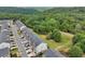 Panoramic aerial view highlighting the community's peaceful setting surrounded by lush greenery and mature trees at 3846 Chattahoochee Summit Se Dr # 31, Atlanta, GA 30339