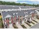 Aerial view of a residential townhome community with well-maintained landscaping and convenient parking at 3846 Chattahoochee Summit Se Dr # 31, Atlanta, GA 30339