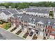 Overhead view of a townhome community showcasing neat landscaping and uniform architecture at 3846 Chattahoochee Summit Se Dr # 31, Atlanta, GA 30339