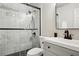 Modern bathroom with marble tile, glass-enclosed shower, and sleek vanity at 3846 Chattahoochee Summit Se Dr # 31, Atlanta, GA 30339