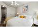 Bright bedroom with neutral walls and colorful pillows and blankets on the bed at 3846 Chattahoochee Summit Se Dr # 31, Atlanta, GA 30339