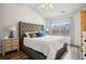 Bedroom showcasing a tufted headboard bed and coordinating nightstands at 3846 Chattahoochee Summit Se Dr # 31, Atlanta, GA 30339