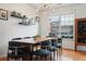 Dining area features a modern table with stylish chairs, decorative lighting, and hardwood floors at 3846 Chattahoochee Summit Se Dr # 31, Atlanta, GA 30339
