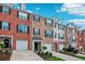 Attractive townhouses show a mix of brick and siding exteriors, with attached garages and neatly maintained landscaping at 3846 Chattahoochee Summit Se Dr # 31, Atlanta, GA 30339