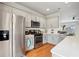 Bright kitchen with stainless steel appliances, light countertops, and ample storage space at 3846 Chattahoochee Summit Se Dr # 31, Atlanta, GA 30339