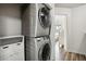 Stacked washer and dryer units with laundry storage nearby at 3846 Chattahoochee Summit Se Dr # 31, Atlanta, GA 30339