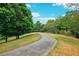 Picturesque walking path meanders through beautifully landscaped grounds, perfect for peaceful strolls and enjoying nature at 3846 Chattahoochee Summit Se Dr # 31, Atlanta, GA 30339