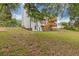 Landscaped backyard features a spacious lawn and multi-level deck at 470 Brackin Trce, Grayson, GA 30017
