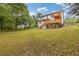 Large landscaped backyard showcases multi-level deck, perfect for outdoor entertaining at 470 Brackin Trce, Grayson, GA 30017