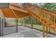 Backyard features wood deck, stairs and secure fencing at 470 Brackin Trce, Grayson, GA 30017
