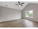 Large bedroom featuring a ceiling fan and a window at 470 Brackin Trce, Grayson, GA 30017