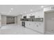 Modern kitchen featuring stainless steel appliances, stone countertops, and ample storage space at 470 Brackin Trce, Grayson, GA 30017