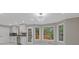 Spacious living room with great natural light, recessed lighting and tile flooring at 470 Brackin Trce, Grayson, GA 30017