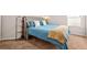 Comfortable bedroom featuring plush carpeting and a stylish upholstered headboard at 113 Expedition Dr, Ellenwood, GA 30294
