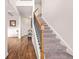 Inviting foyer with hardwood floors and a staircase leading to the second floor at 113 Expedition Dr, Ellenwood, GA 30294