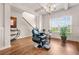 Room with a stylish barber chair, chandelier, and tray ceilings at 113 Expedition Dr, Ellenwood, GA 30294