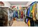 Spacious walk-in closet with ample storage and organization system, perfect for any wardrobe at 113 Expedition Dr, Ellenwood, GA 30294