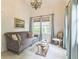 Elegant sitting room with comfortable seating, natural light, and stylish decor at 3938 Hillsman Ln, Marietta, GA 30062