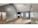 Spacious living room with vaulted ceiling, fireplace, and neutral carpet, ready for relaxation at 4005 Brushymill Ct, Loganville, GA 30052