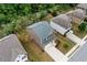 Aerial view of a well-maintained home with a fenced backyard, green lawn, and landscaping at 4120 Cordova Ln, Cumming, GA 30028