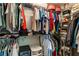 Walk-in closet features clothing racks, shelves, and storage at 5830 Sterling Ct, Cumming, GA 30040