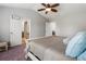 Vaulted main bedroom boasts a view of the en-suite bathroom and walk-in closet at 5830 Sterling Ct, Cumming, GA 30040