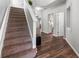 Carpeted staircase with white risers leads to the upper level at 5830 Sterling Ct, Cumming, GA 30040