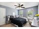 Charming bedroom with natural light, light blue walls and modern furniture at 10 Callaway Ct, Hiram, GA 30141