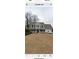 Two-story house with welcoming front porch, attached garage and green lawn in need of watering at 10 Callaway Ct, Hiram, GA 30141