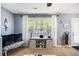 Cozy living room space featuring a large window with bright natural light at 10 Callaway Ct, Hiram, GA 30141