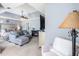 Spacious main bedroom with sitting area, ceiling fan, en suite and ample natural light at 10 Callaway Ct, Hiram, GA 30141
