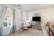 Bright sitting room with large windows, stylish decor, and plush seating at 10 Callaway Ct, Hiram, GA 30141