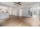 Open-concept living area with wood floors, seamlessly connecting to the entryway and kitchen at 1024 Odelle Cir, Mcdonough, GA 30253