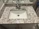 Bathroom featuring a stylish granite countertop and basin sink at 105 Lena Cir, Stockbridge, GA 30281