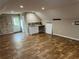 This flexible space is a bonus room with wood flooring and potential for many uses at 284 Harris Loop, Dallas, GA 30157