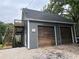 Detached two-car garage featuring an upper-level deck, offering extra space at 284 Harris Loop, Dallas, GA 30157