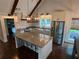 Stunning, remodeled kitchen featuring granite countertops, modern lighting, and stainless appliances at 284 Harris Loop, Dallas, GA 30157